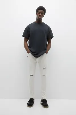 Jean superskinny avec déchirures