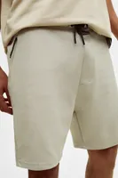 Bermuda jogger poches fermeture Éclair