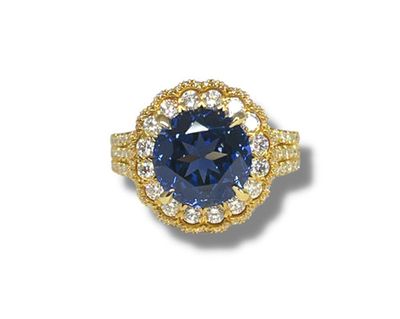 The Scallop Sapphire Halo Engagement Ring