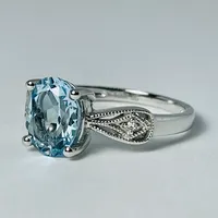 10kt White Gold Blue Topaz & Diamond Ring