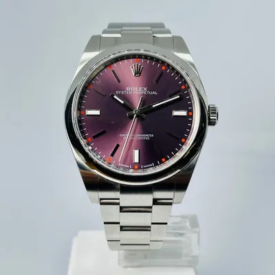 Rolex Oyster Perpetual - Red Grape Dial