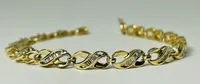 14kt Gold 1.50ctw Diamond Baguette Tennis Bracelet