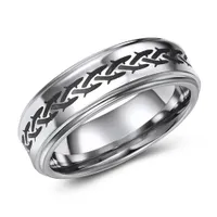 7mm wide concave tungsten band with barb wire pattern