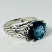 14kt White Gold Blue Topaz & Diamond Ring