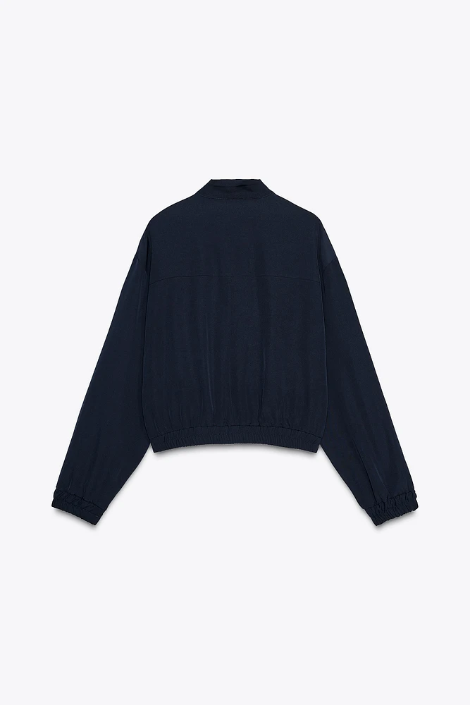 VESTE À BANDE LATÉRALE