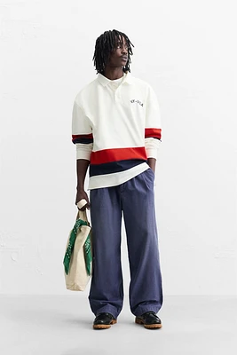 POLO WITH CONTRASTING SIDE STRIPE