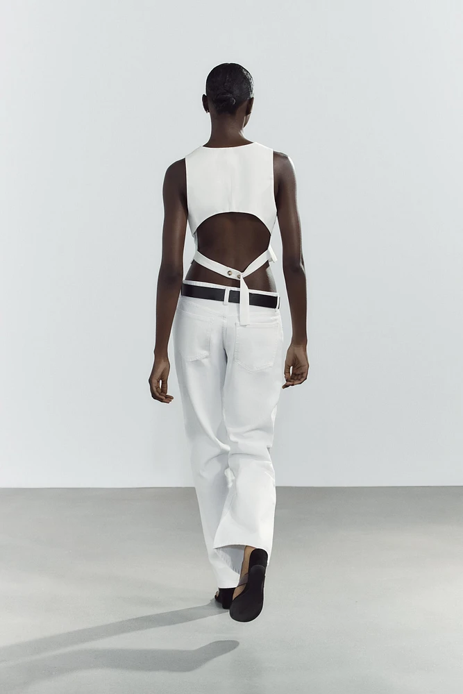 GILET AJOURÉ AU DOS