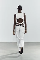 GILET AJOURÉ AU DOS