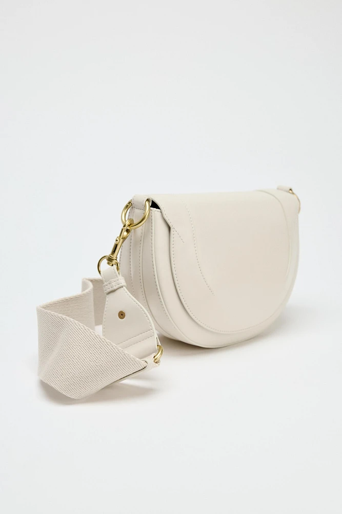 SAC BANDOULIÈRE À SURPIQÛRES CANVAS