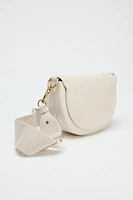 SAC BANDOULIÈRE À SURPIQÛRES CANVAS
