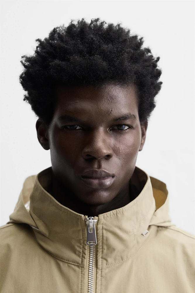 TECHNICAL PARKA WITH POCKETS