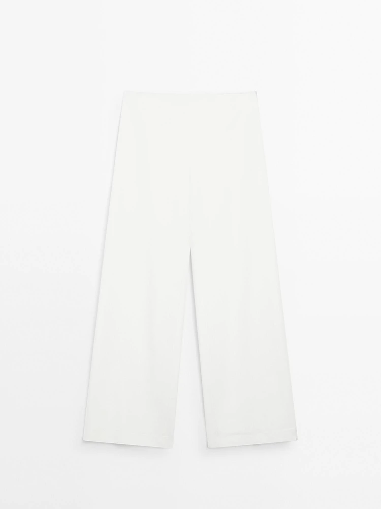 High-waist palazzo trousers - STUDIO