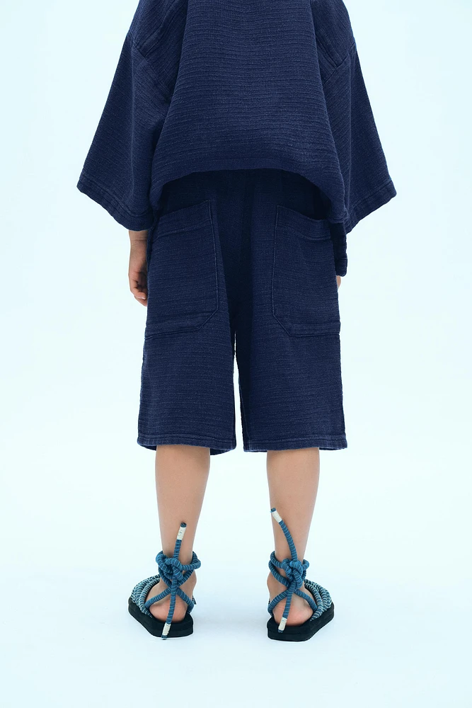 PLEATED DENIM SHORTS X FANGLU LIN