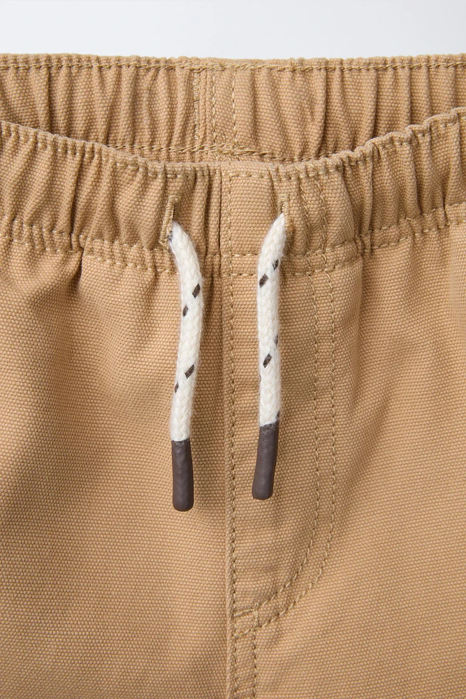 CONTRASTING POCKET TWILL SHORTS