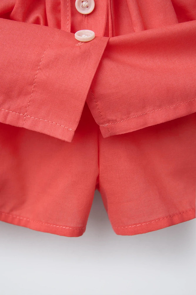 BUTTON SKORT