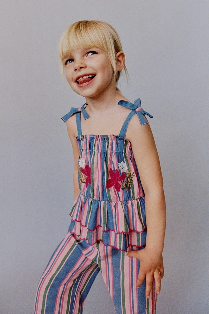 STRIPED TOP WITH EMBROIDERED FLOWERS