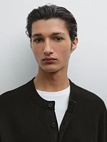 Cotton knit sweater with buttoned neck