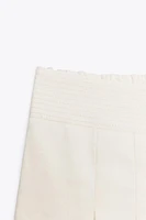 PLEATED MINI SKORT