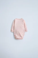 TWO-PACK OF ADJUSTABLE BODYSUITS