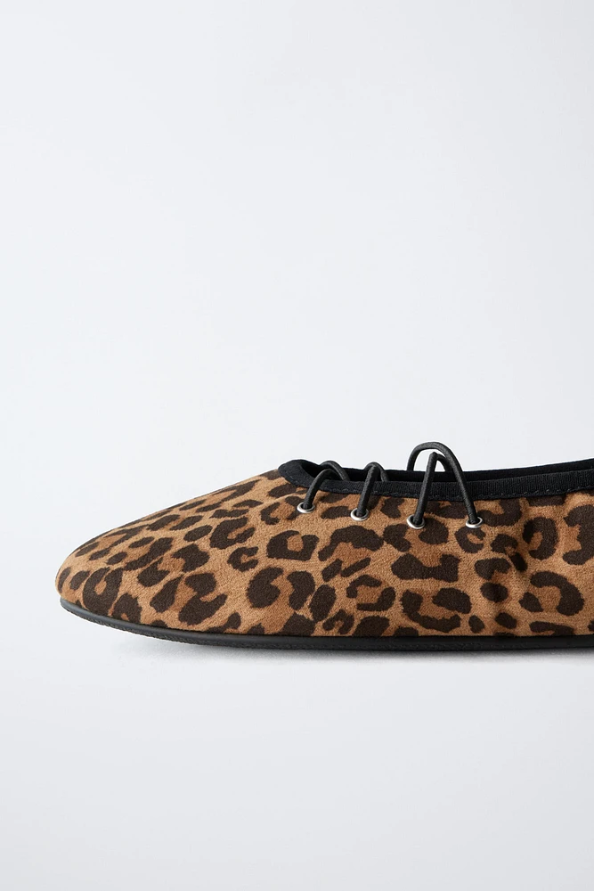 ANIMAL PRINT LACED BALLET FLATS