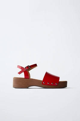PATENT-FINISH CLOGS