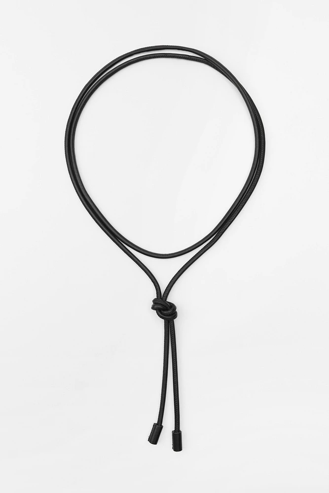 CEINTURE EN CORDON CIRCULAIRE EN CUIR