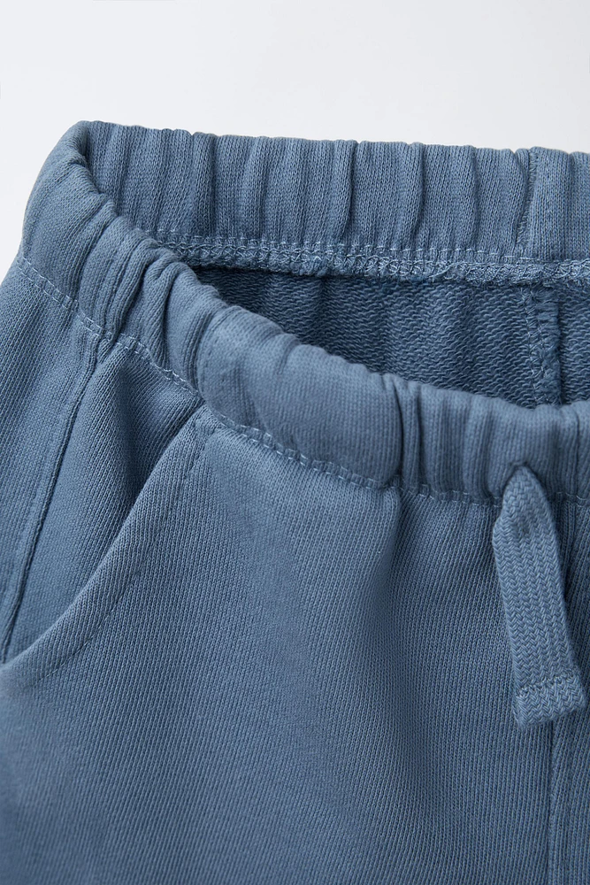 PLUSH LOGO SHORTS