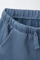 PLUSH LOGO SHORTS