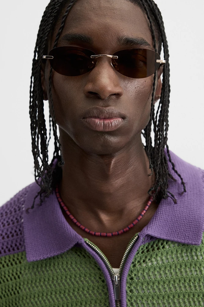 POLO EN MAILLE À RAYURES TEXTURÉ