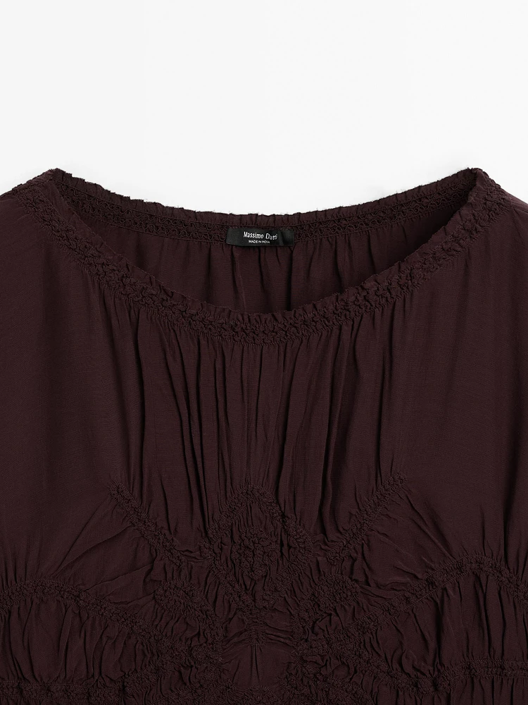 Flowing blouse with gathered detail