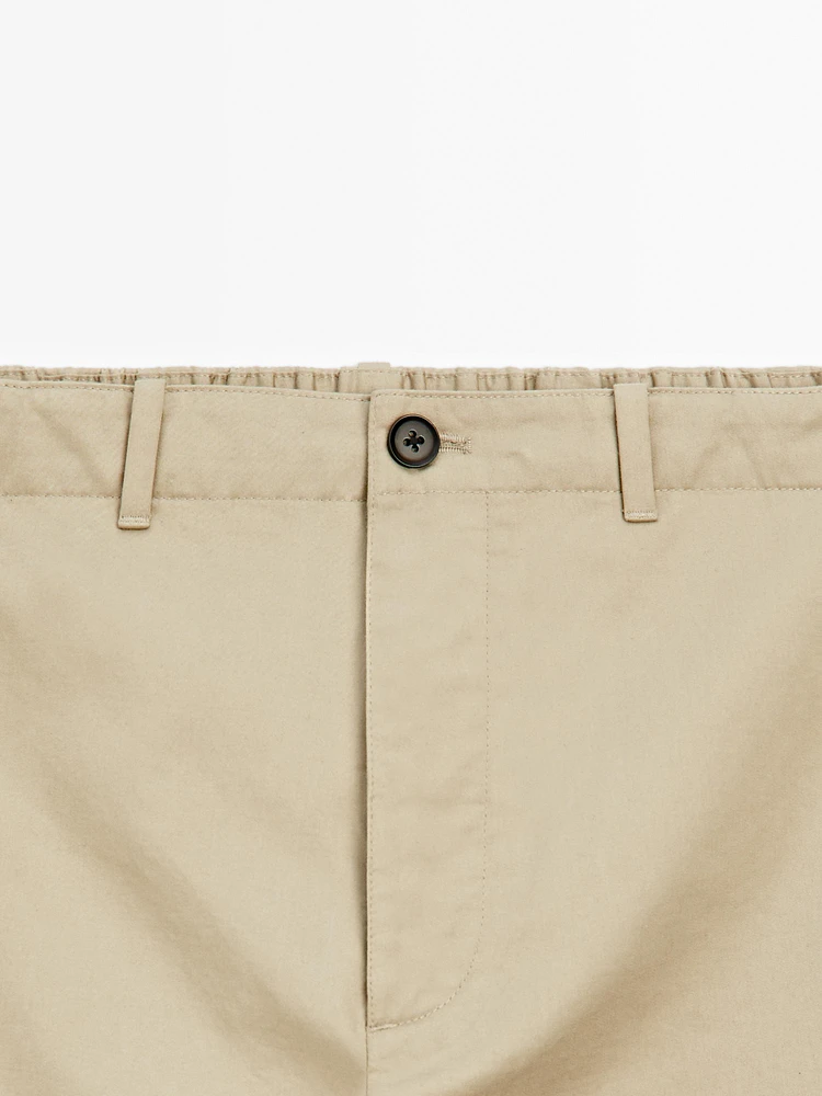 Trousers with patch pocket