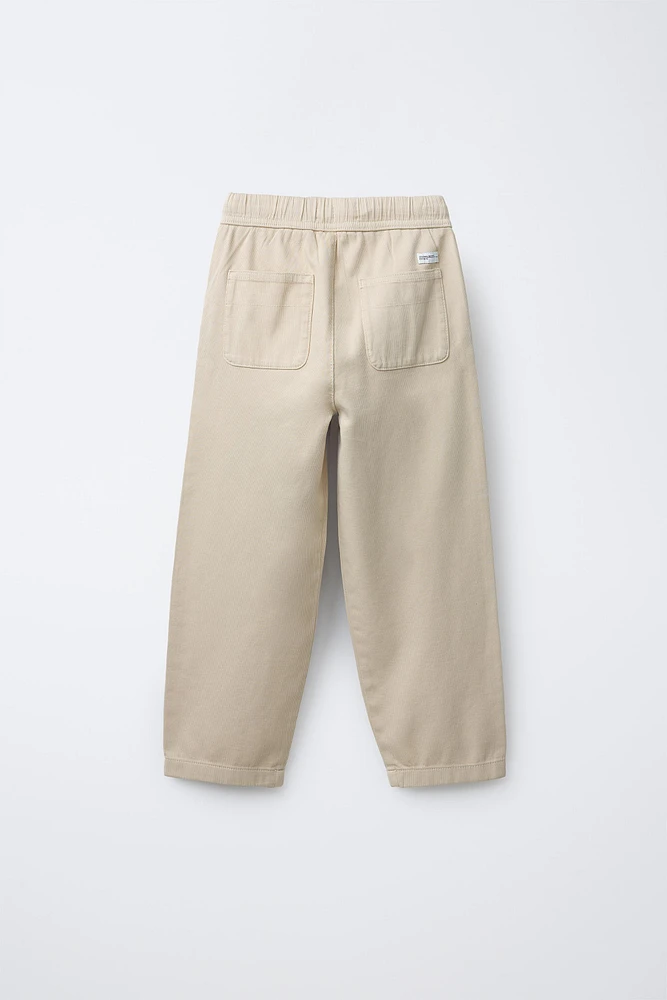 TEXTURED STRETCH PANTS