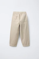TEXTURED STRETCH PANTS