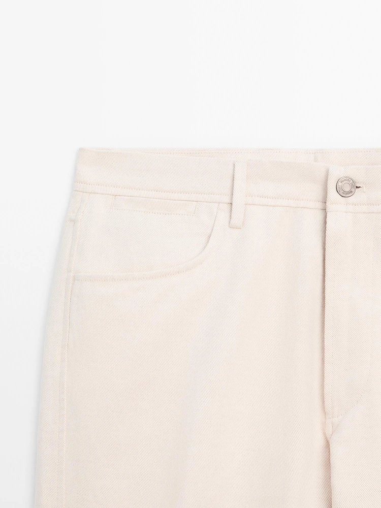 Cotton blend tapered fit denim trousers