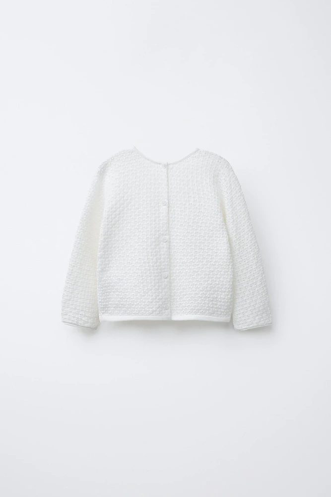 OPEN KNIT SWEATER