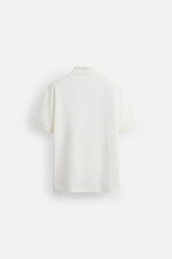POLO À COL ZIPPÉ