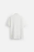 POLO À COL ZIPPÉ
