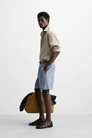 STRIPED CRINKLED EFFECT BERMUDA SHORTS