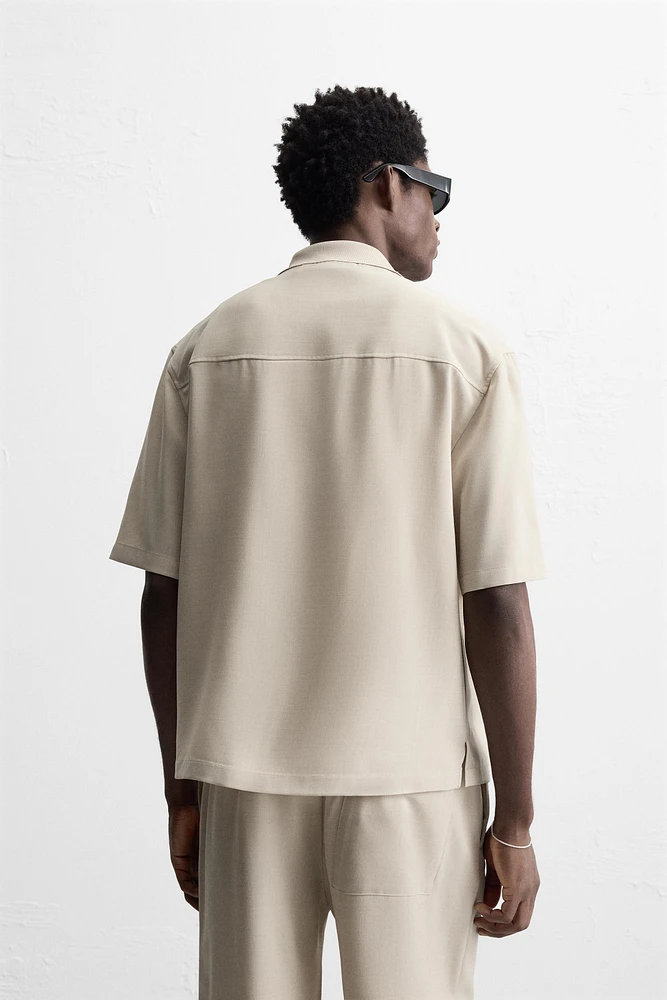 FLOWY POLO SHIRT