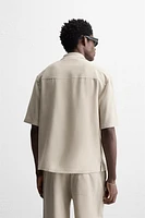 FLOWY POLO SHIRT