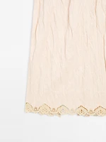 Jupe midi fluide à dentelle