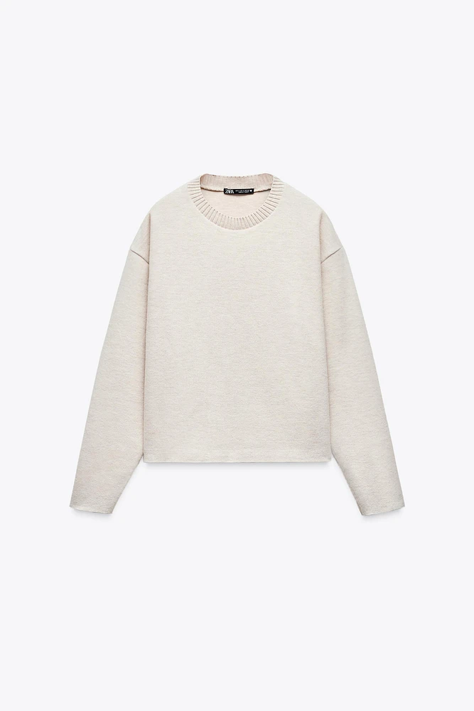 PULL AU TOUCHER DOUX
