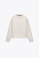 PULL AU TOUCHER DOUX