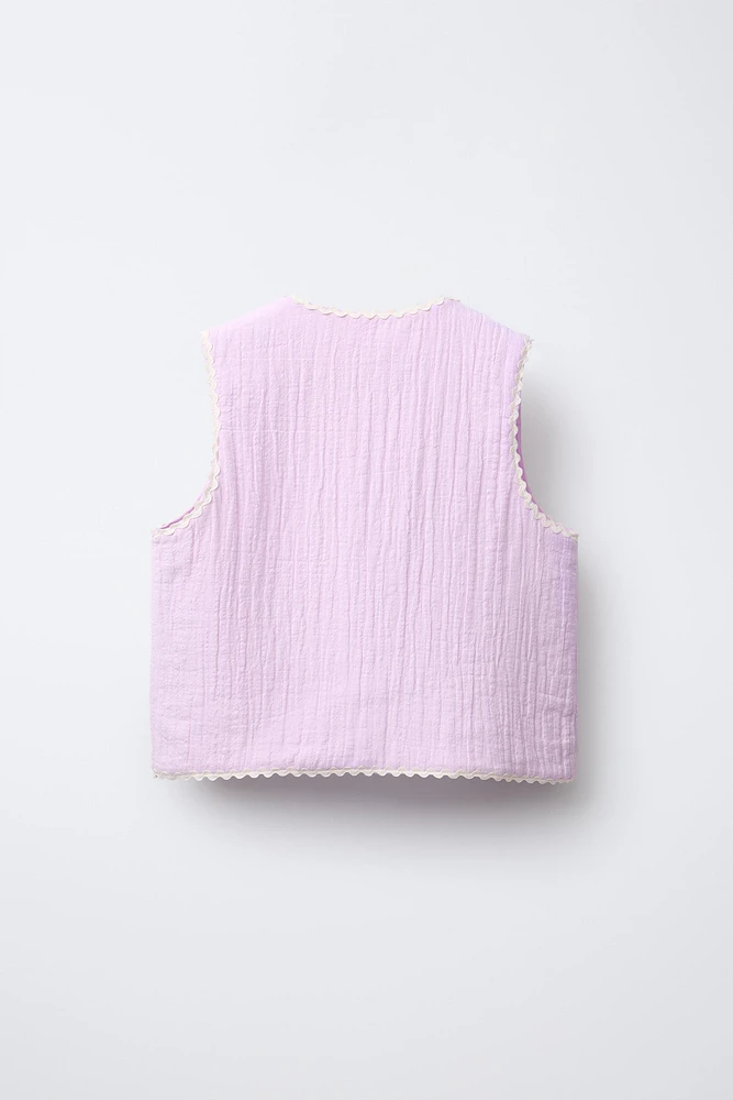 GILET TEXTURÉ ONDULINE