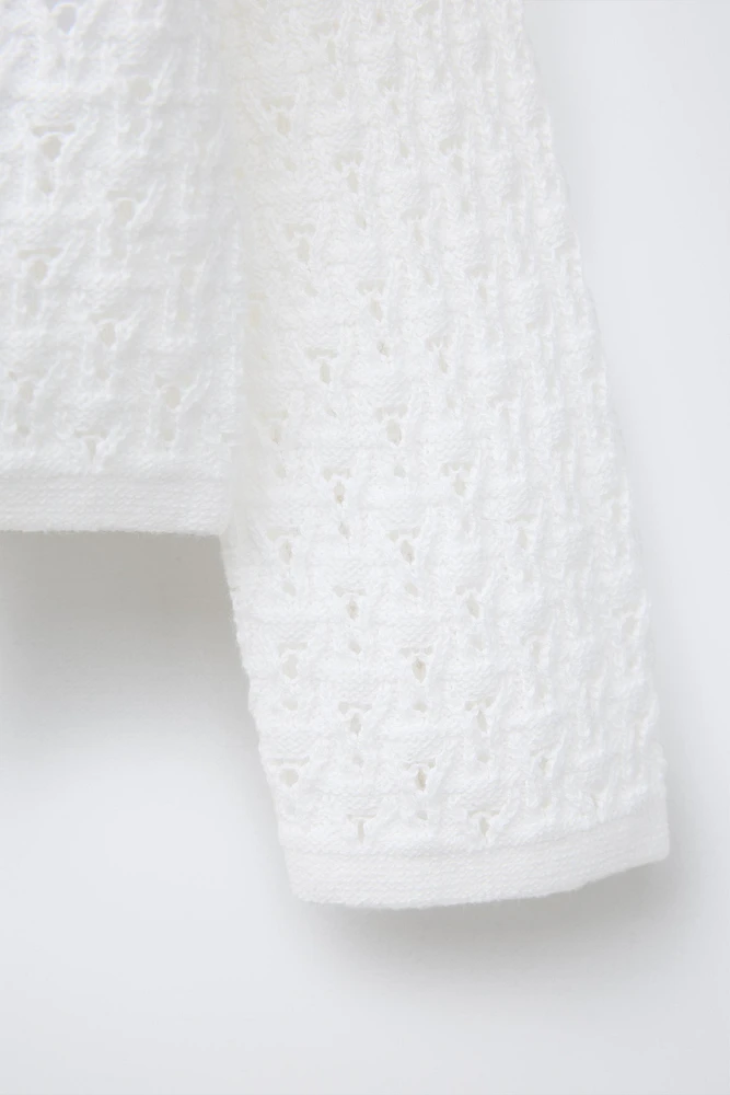 GILET EN MAILLE AJOURÉE