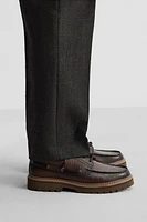 EMBOSSED BOAT SHOES