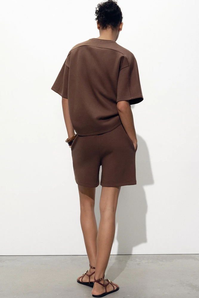 SHORT SLEEVE INTERLOCK SWEATSHIRT