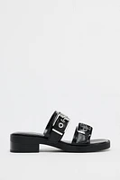 FLAT BUCKLED SANDALS