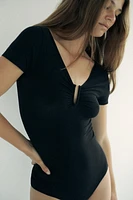 BODY RÉSILLE PIÈCE MÉTALLIQUE