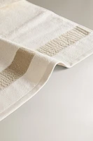 SERVIETTE DE BAIN BORDURE TEXTURE